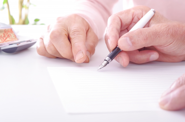 ノートに書く夫婦